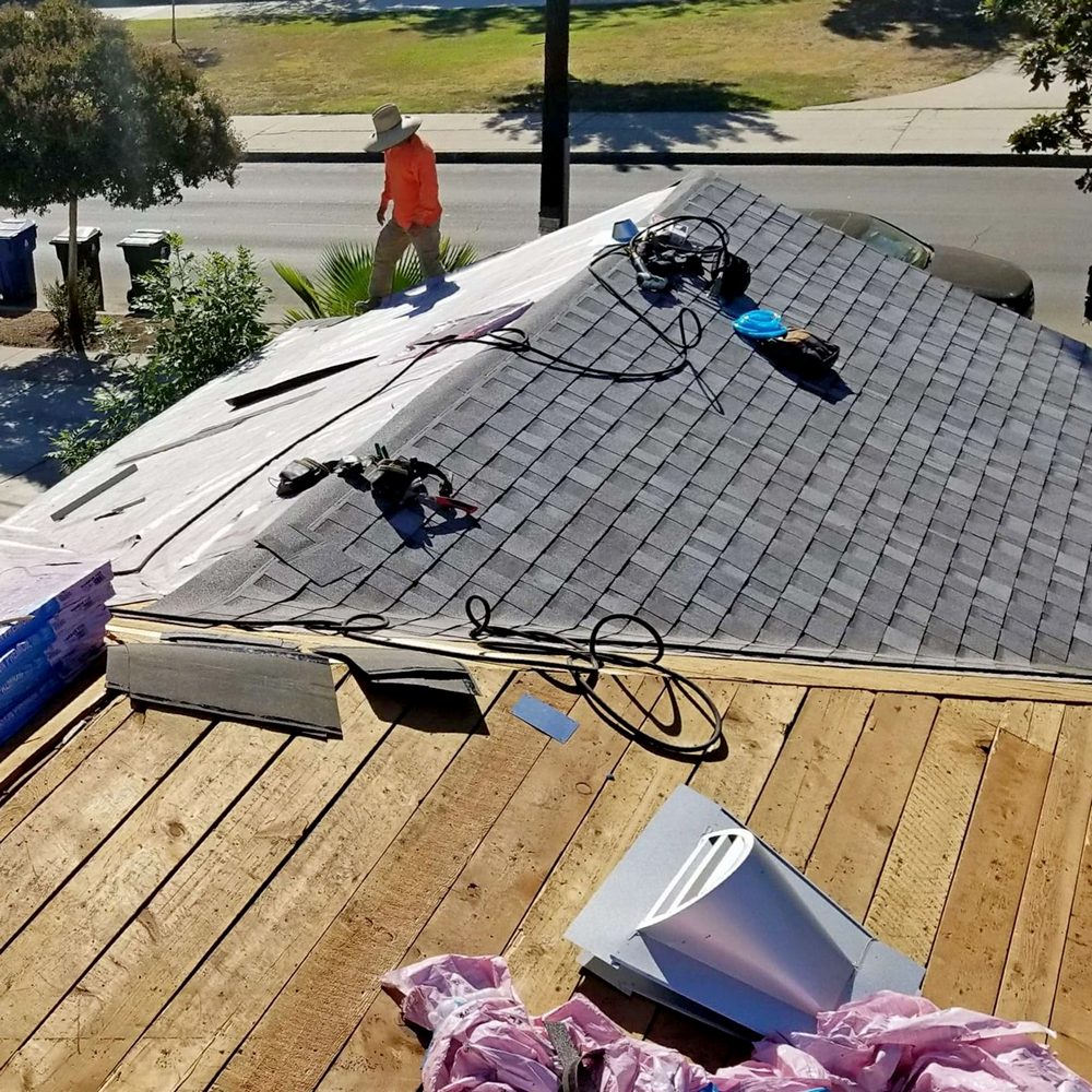 specializing in residential and commercial roof repair, replacement, and installation.